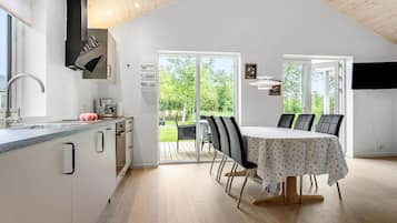 Fridge, stovetop, dishwasher, coffee/tea maker