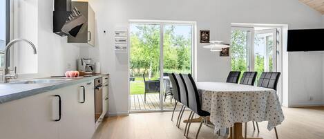 Fridge, stovetop, dishwasher, coffee/tea maker