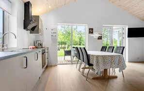 Fridge, stovetop, dishwasher, coffee/tea maker