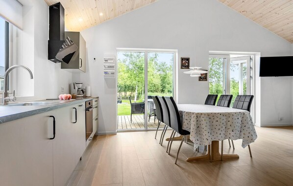 Fridge, stovetop, dishwasher, coffee/tea maker