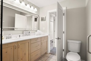 Bathroom #1 with shower en-suite to bedroom #1