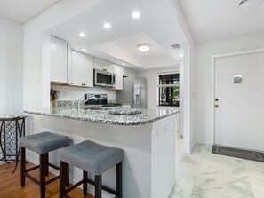 Microwave, oven, stovetop, dishwasher - Charming 2-bedroom condo with AC, WiFi, in Venice, 2 miles from Venice Island.  (Venice)