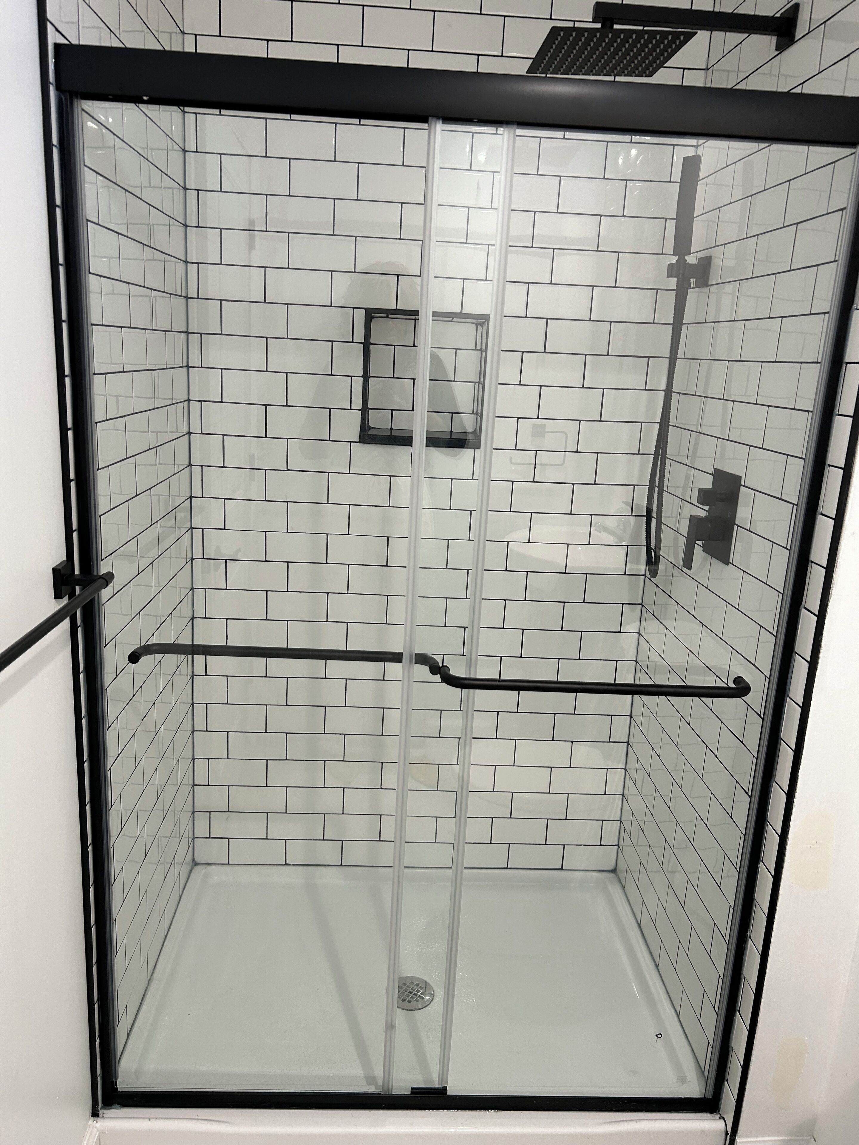 Shower, towels, soap, toilet paper