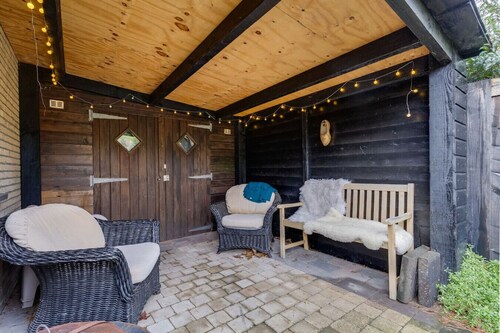 Welkom in ons huisje in het bos met prive sauna