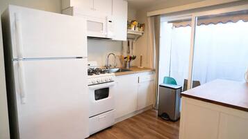 Superior Suite, Patio | 1 bedroom, desk, laptop workspace, iron/ironing board