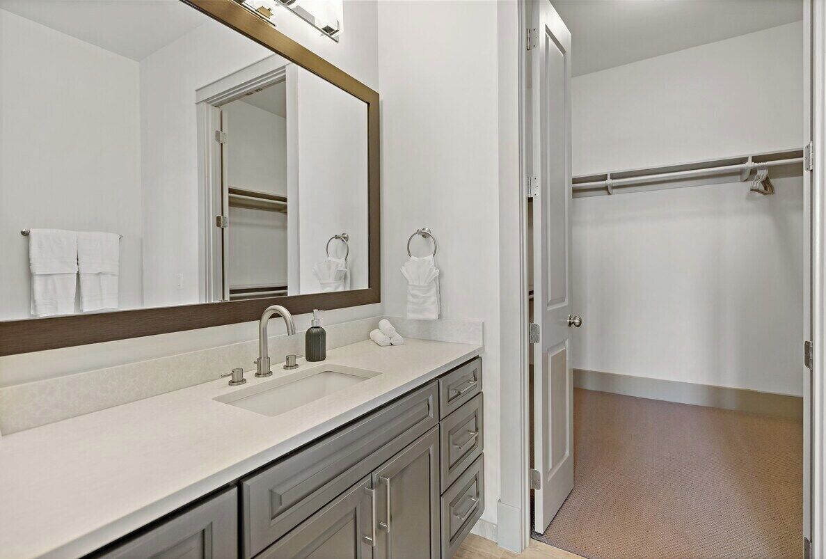En suite private bathroom. Plenty of storage in the large walk in closet.