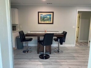 Dining - Charming 2-bedroom house with dock, AC, & Wifi. Enjoy kayaking
2 min from beach (Vero Beach)