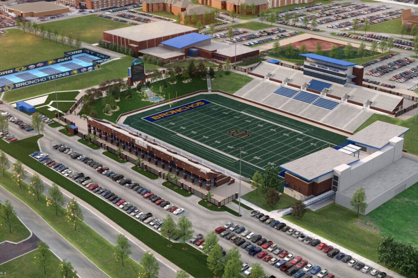 A sports complex with a football field, tennis courts, and multiple parking lots.
