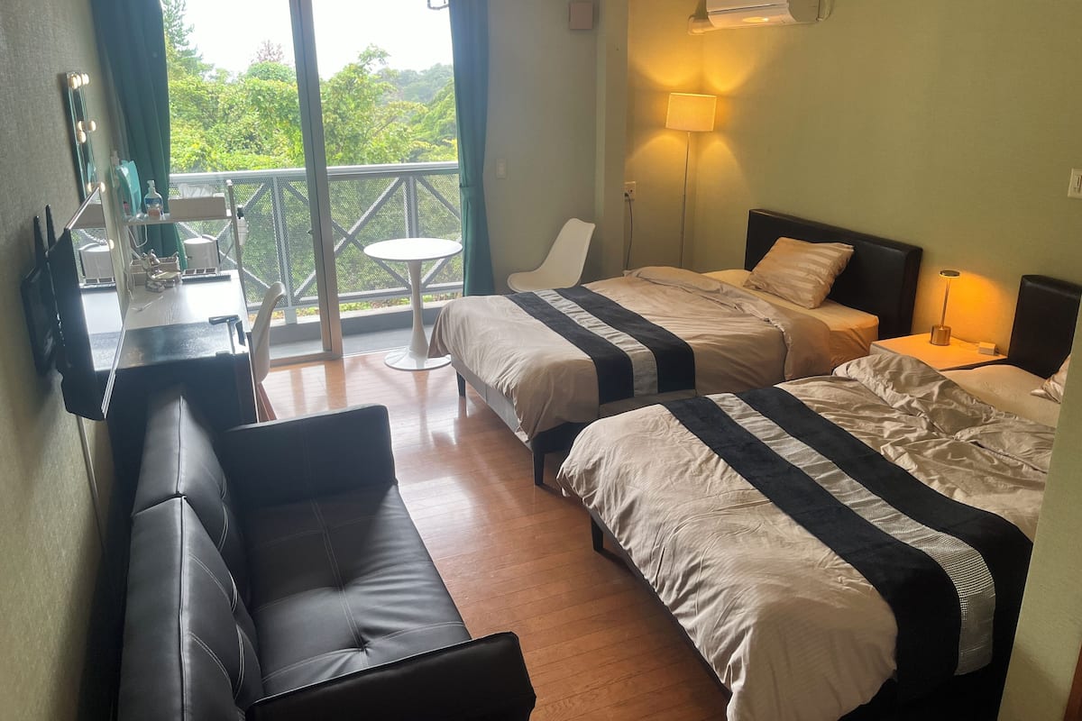 Deluxe-Dreibettzimmer, Balkon, Buchtblick