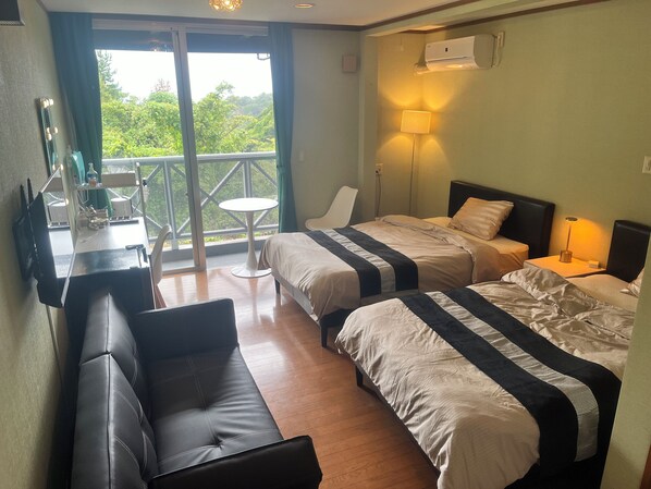 Deluxe Triple Room, Balcony, Bay View | Iron/ironing board, free cribs/infant beds, free WiFi