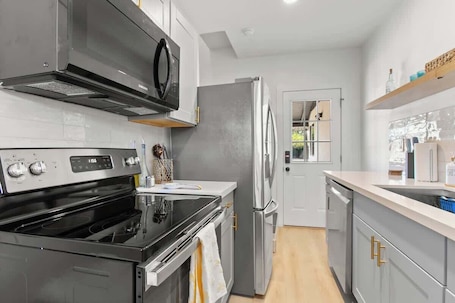 Fridge, microwave, oven, stovetop. Modern 2-Story Midtown Loft + Covered Parking