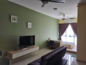 1 soverom og strykejern/-brett