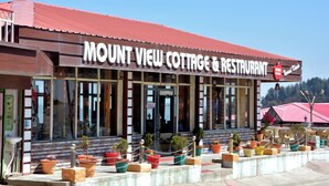 A building with a sign reading "Mount View Cottage & Restaurant". - Mount View Dhanaulti Dreams (Dhanaulti)