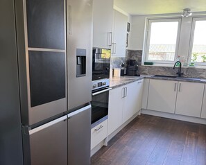 Fridge, microwave, dishwasher, highchair