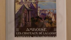 A framed poster of a castle by the river with the text "CHEMIN DE FER D'ORLEANS" and "AMBOISE LES CHATEAUX DE LA LOIRE CIRCUITS AUTOMOBILES". - Amboise Une Vie de château (Tours)
