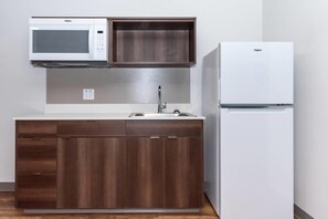 Desk, blackout curtains, free WiFi, bed sheets - WoodSpring Suites Buford near Mall of Georgia-Lake Lanier (Buford)