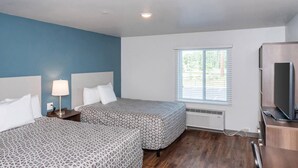 Habitación estándar, 2 camas Queen size, para no fumadores | Escritorio, cortinas blackout, wifi gratis y ropa de cama 