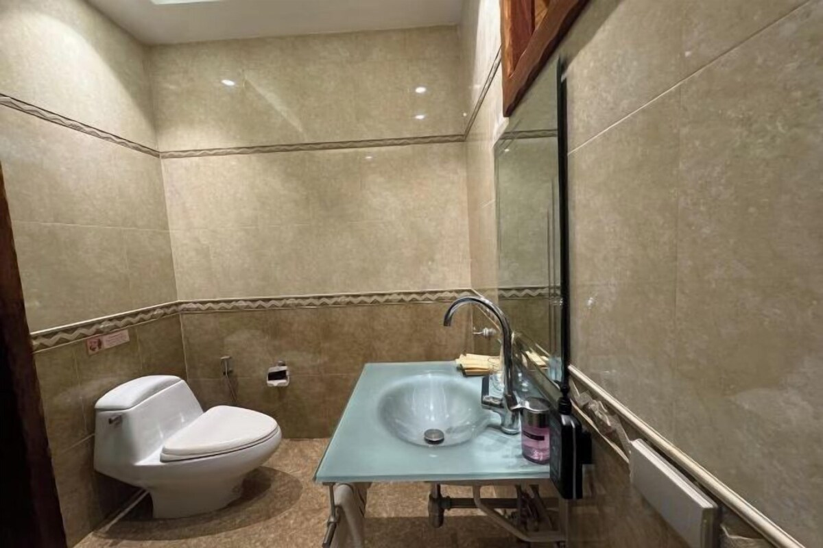 Bathroom | Free toiletries, hair dryer, slippers, towels