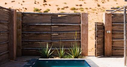 Indulge in desert opulence with our Luxury Pool Tents at Thousand Nights Camp