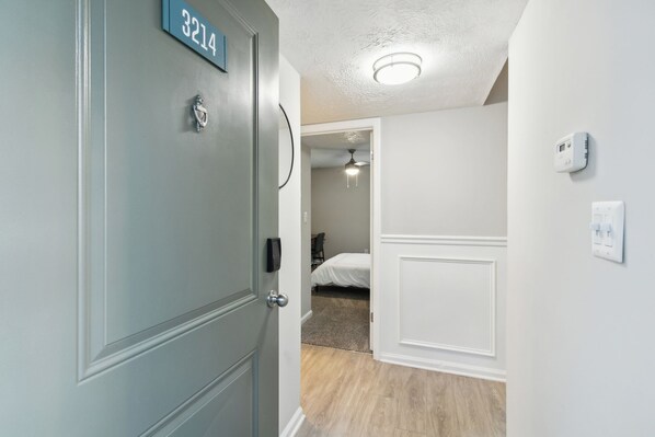 1 bedroom, desk, iron/ironing board, travel crib