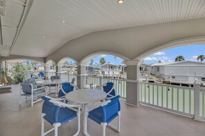 Outdoor dining - Amazing Waterfront Views! Right on the Canal - Villa 143 (Port Isabel)