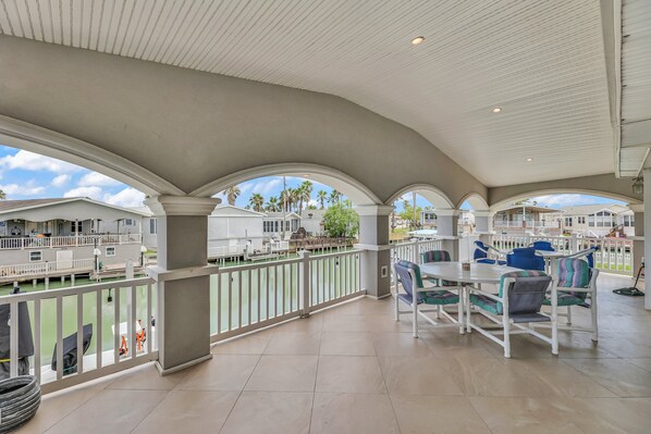 Outdoor dining - Amazing Waterfront Views! Right on the Canal - Villa 143 (Port Isabel)