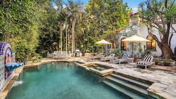 Outdoor pool, pool umbrellas, sun loungers