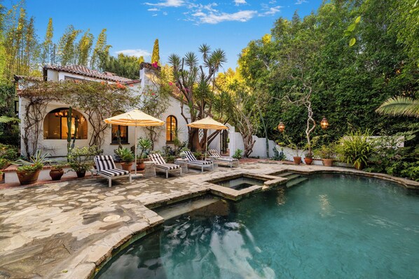 Outdoor pool, pool umbrellas, sun loungers