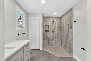 Shower, hair dryer, towels