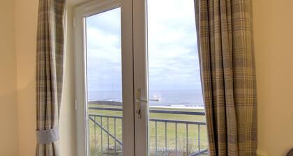 First floor 2-bedroom apartment with views over the famous James Braid Brora Golf Course.