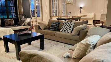 TV, fireplace, books