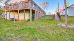 A two-story house with a balcony, a wooden deck, and a small garden area. - 2 Mi to Lake Cumberland Access: Home w/ Grill (Jamestown)