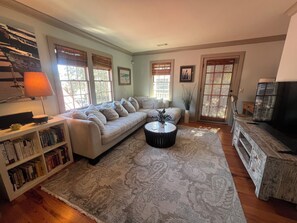 Smart TV, DVD player, books, stereo - Designer 2BR Historic Condo Near Hampton Park • Private Balconies (Charleston)