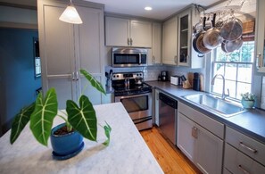 Private kitchen - Designer 2BR Historic Condo Near Hampton Park • Private Balconies (Charleston)