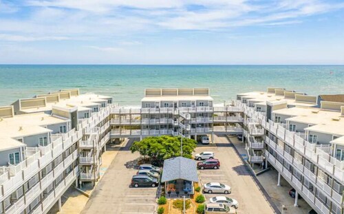 Spectacular partial ocean view 2BR 2BA large top floor condo-beachfront complex!