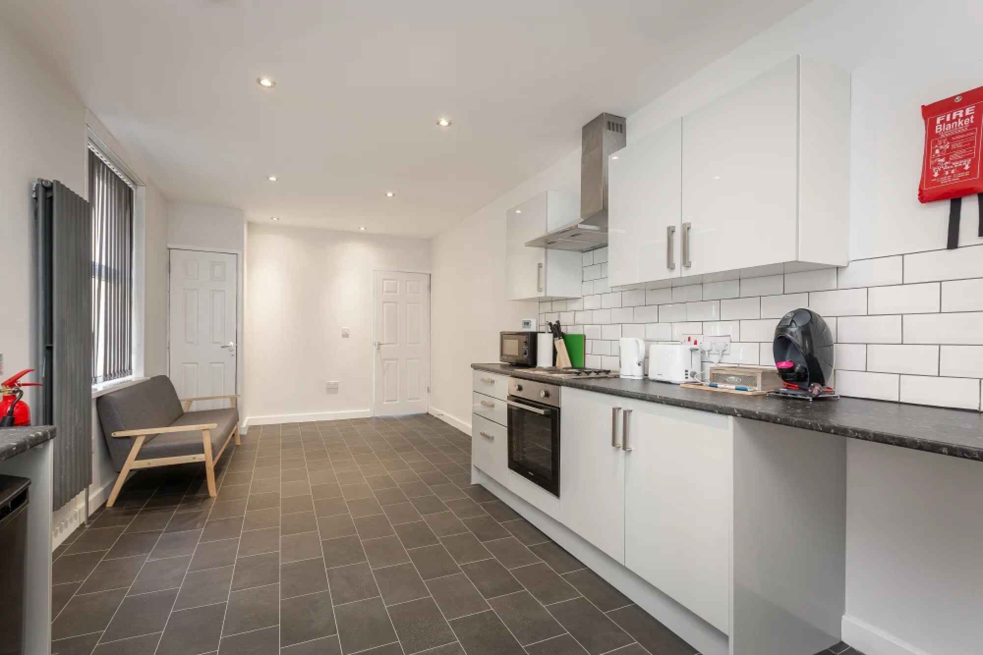 Standard House, 4 Bedrooms | Desk, laptop workspace, iron/ironing board, free WiFi