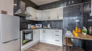 Apartemen Superior, 3 kamar tidur | 1 kamar tidur, meja kerja, dan ruang kerja ramah laptop