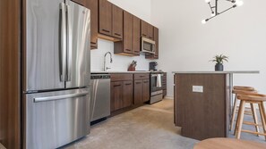 Fridge, dining tables - Landing | Incredible 1BD, Courtyard, Pool (St. Louis)