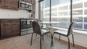 Fridge, dining tables - Landing | Amazing Studio, Pool, Gym (St. Louis)