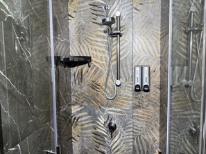 Shower, eco-friendly toiletries, hair dryer, bidet