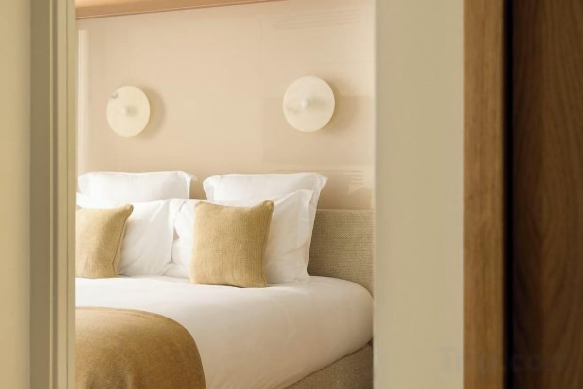 Premium bedding, pillow-top beds, in-room safe, soundproofing