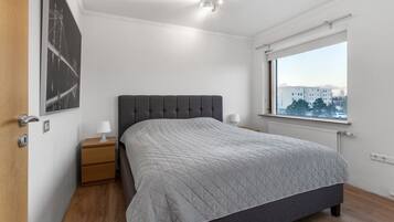 1 bedroom, desk, iron/ironing board, travel crib