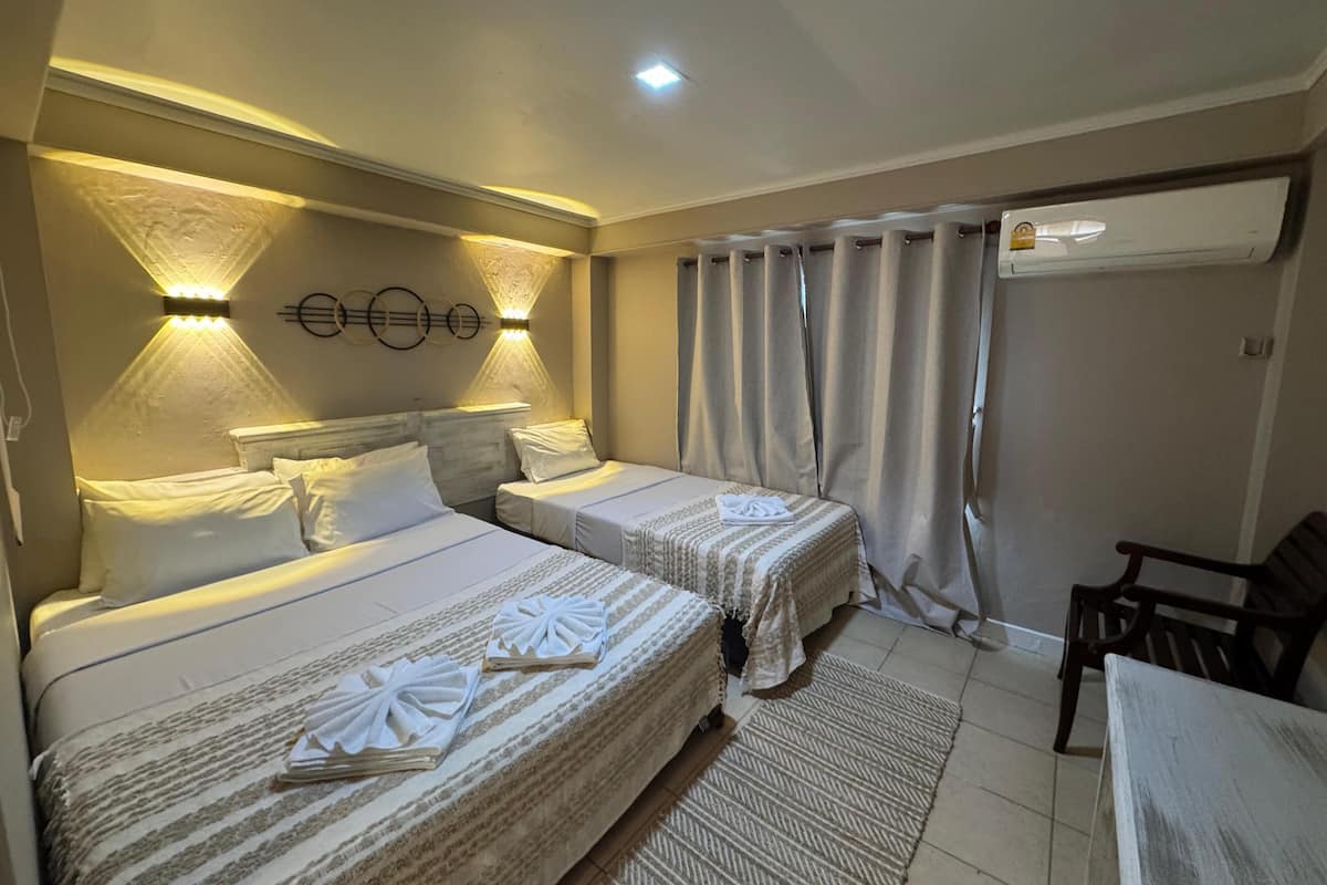 Family Triple Room | Egyptian cotton sheets, premium bedding, memory foam beds, minibar