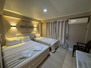 ห้องแฟมิลี่ทริปเปิล | ผ้าปูที่นอนฝ้ายอียิปต์, เครื่องนอนระดับพรีเมียม, เตียงเมมโมรีโฟม