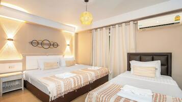 Egyptian cotton sheets, premium bedding, memory-foam beds, minibar