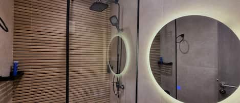 Shower, eco-friendly toiletries, hair dryer, towels