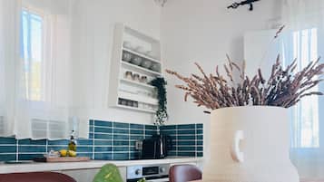 Apartment, Bay View | Private kitchen | Espresso maker, mini-fridge, oven, stovetop