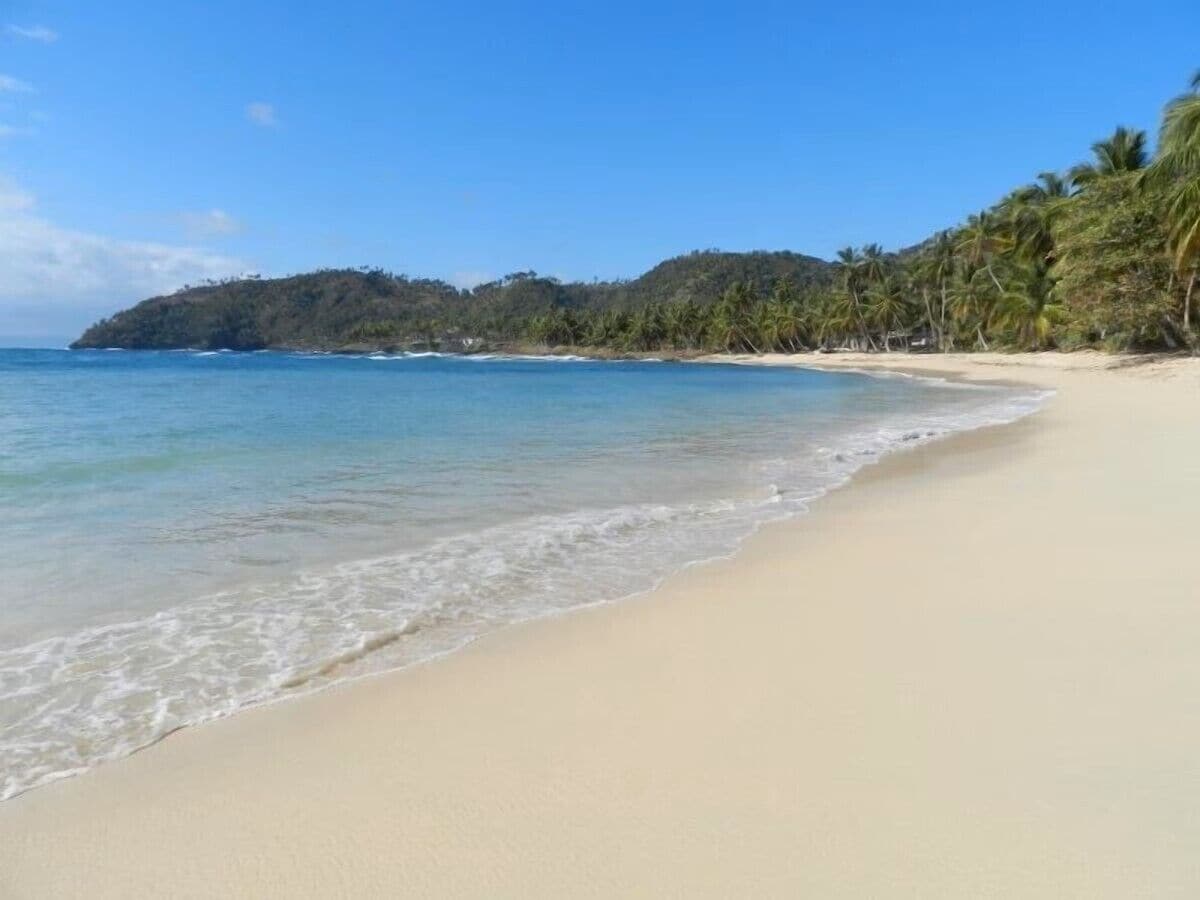 On the beach, sun loungers, beach towels