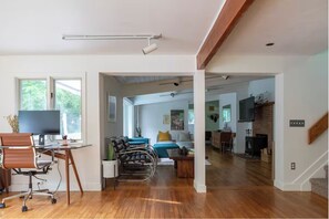 Smart TV, fireplace, books, music library