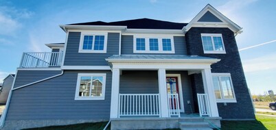 A peaceful cozy three bedroom, home away from home, near Spruce Meadows